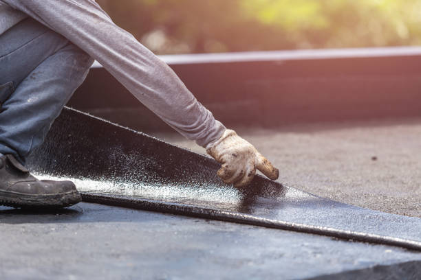 Professional Exterior Waterproofing technician working in Fremont, MI